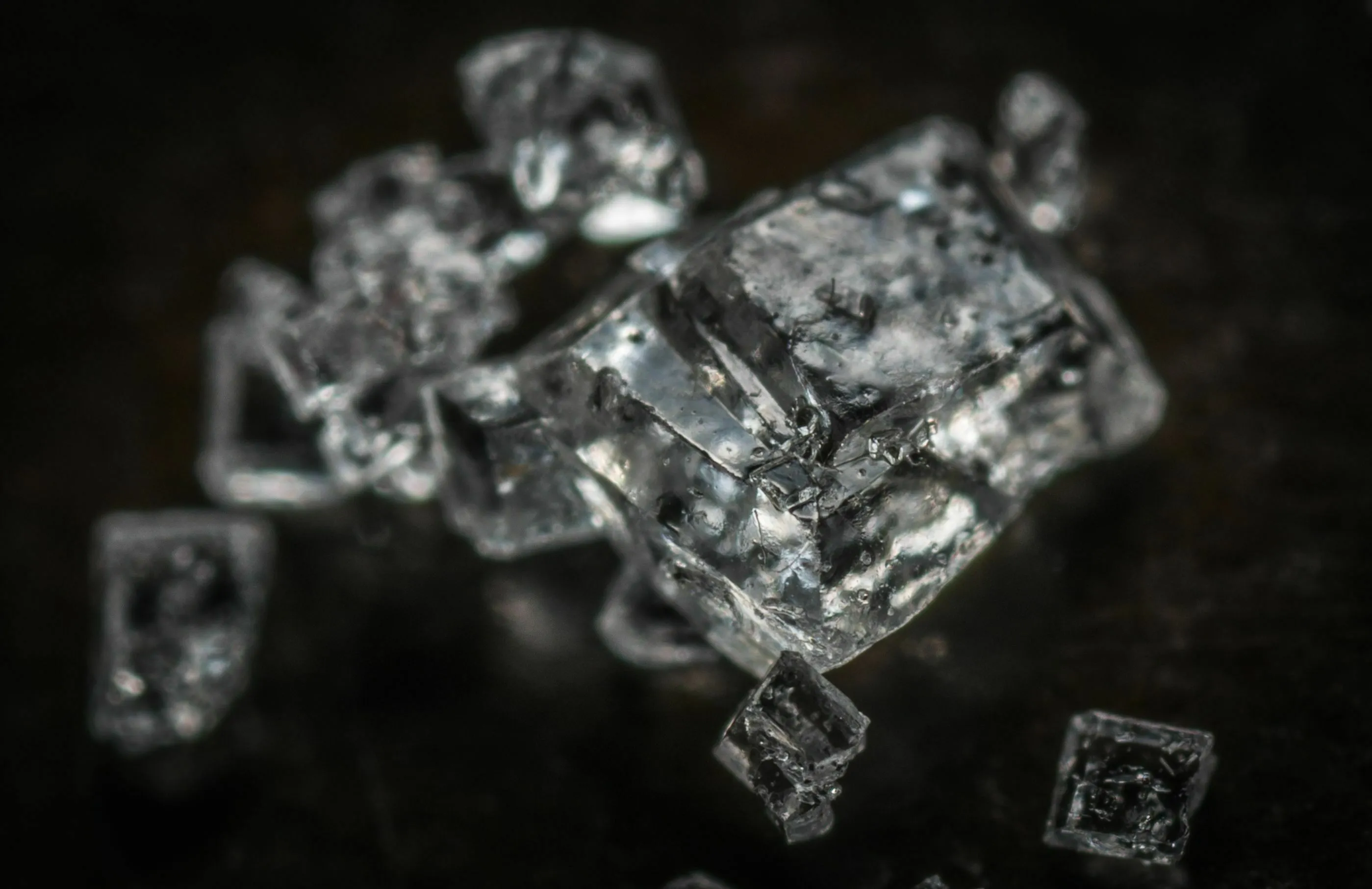 Close-up of sparkling sodium chloride crystals, commonly known as salt, for a general knowledge pub quiz.