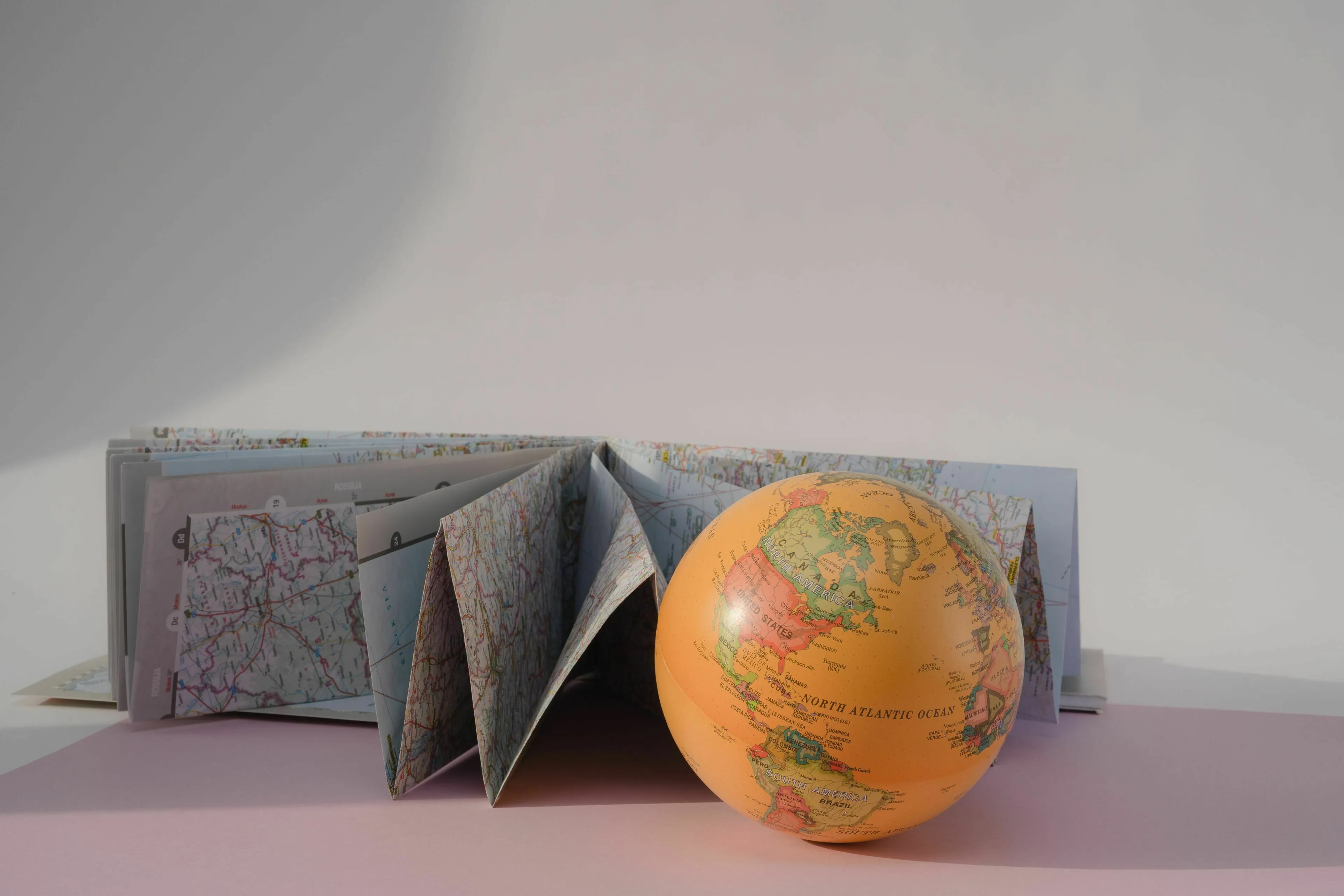 A globe and a map representing continents, perfect for a general knowledge pub quiz.