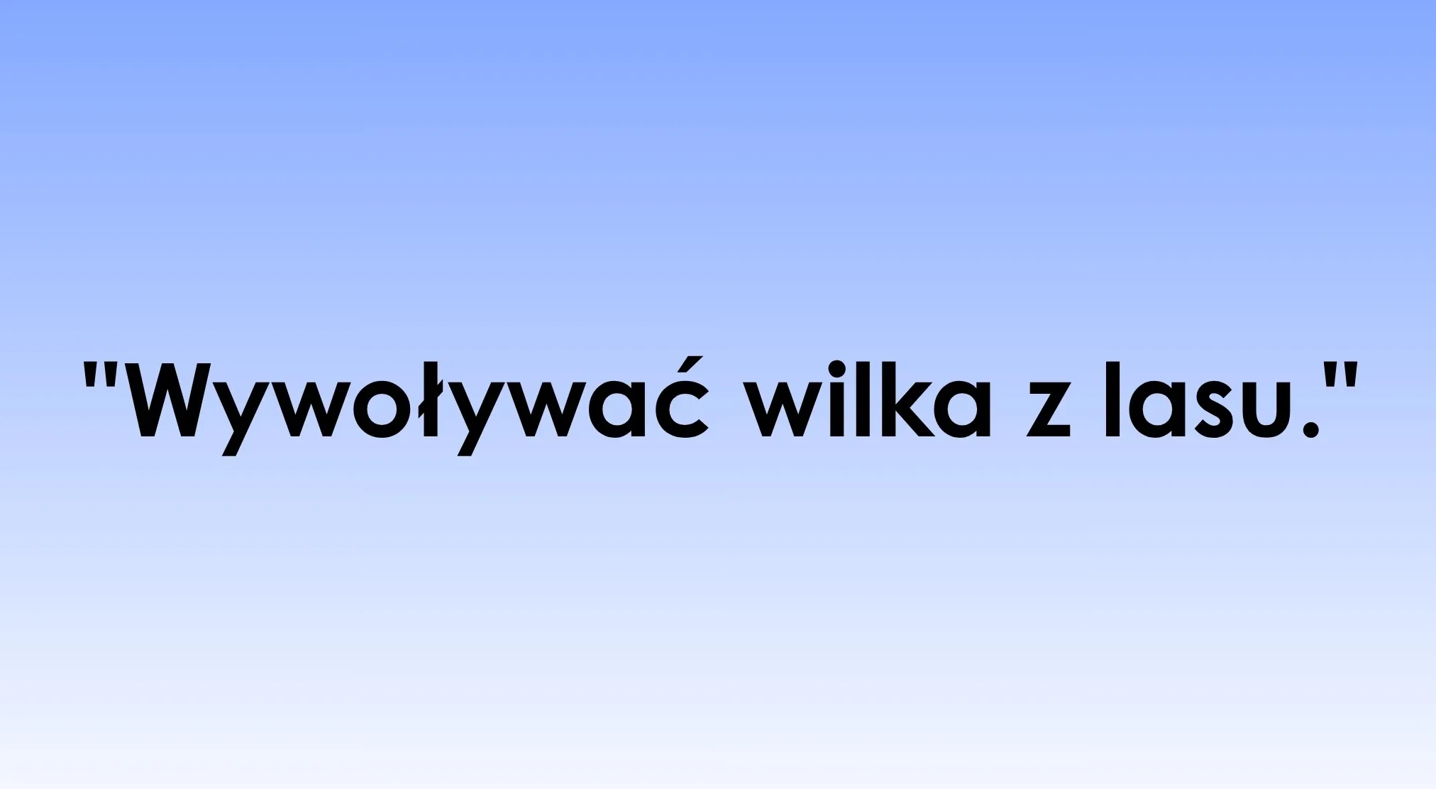 Black text on a blue background displaying "Wywoływać wilka z lasu." inviting viewers to decode the language.