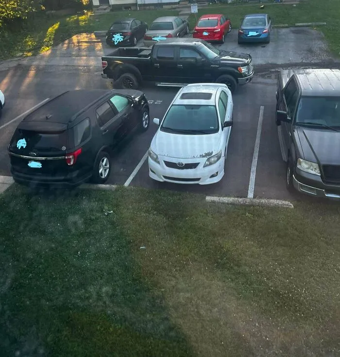 Several cars poorly parked, demonstrating bad parking and lack of common sense by neighbors.