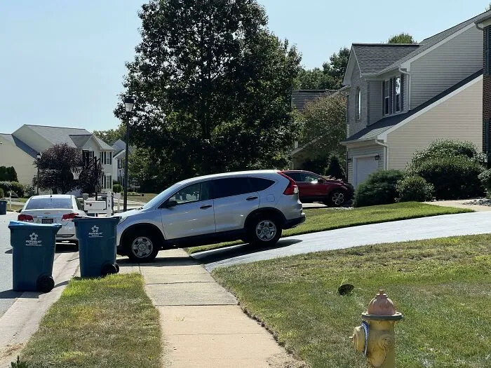 Neighbor Has A 2 Car Garage And 4 Car Driveway