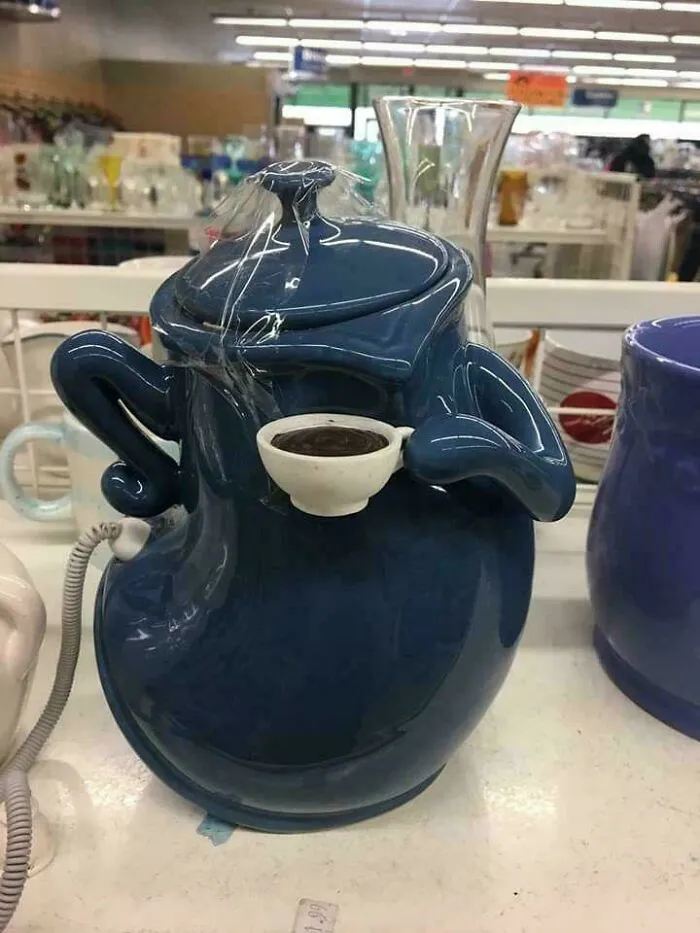A Teapot Drinking Its Own Cup Of Tea