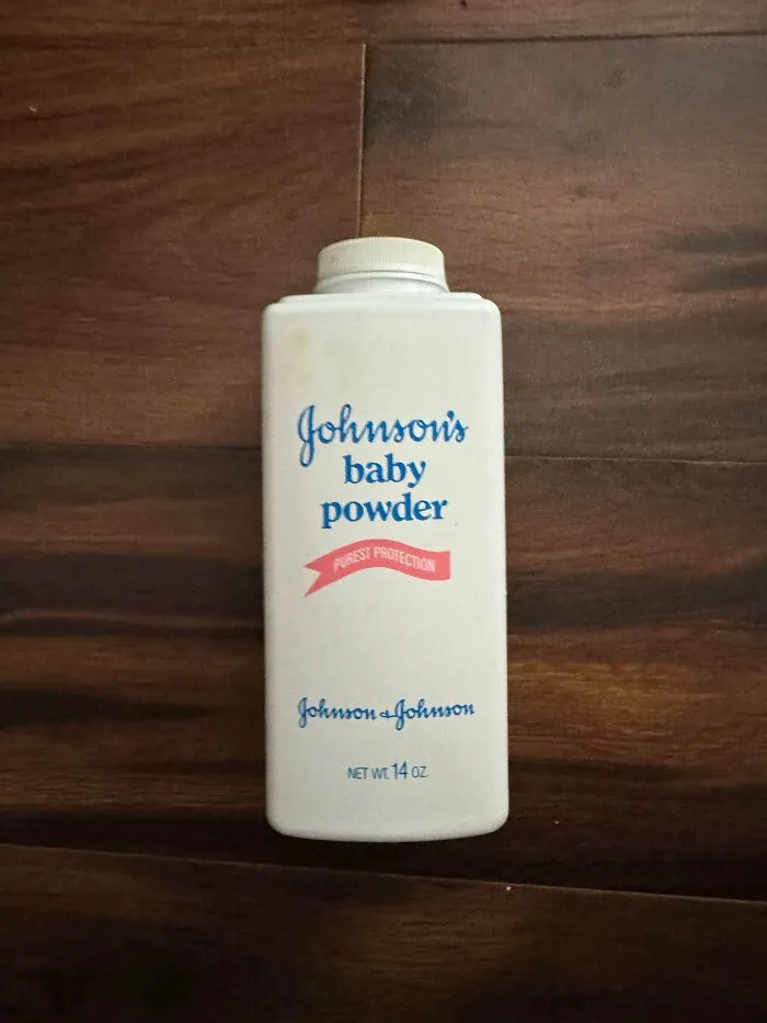 An old container of Johnson's Baby Powder, a vintage product found at home.