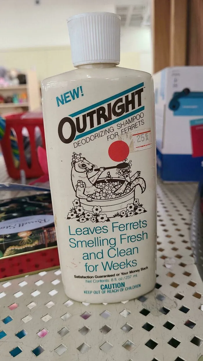 An old bottle of Outright deodorizing shampoo for ferrets, an old product found at home with a 25 cent sticker.