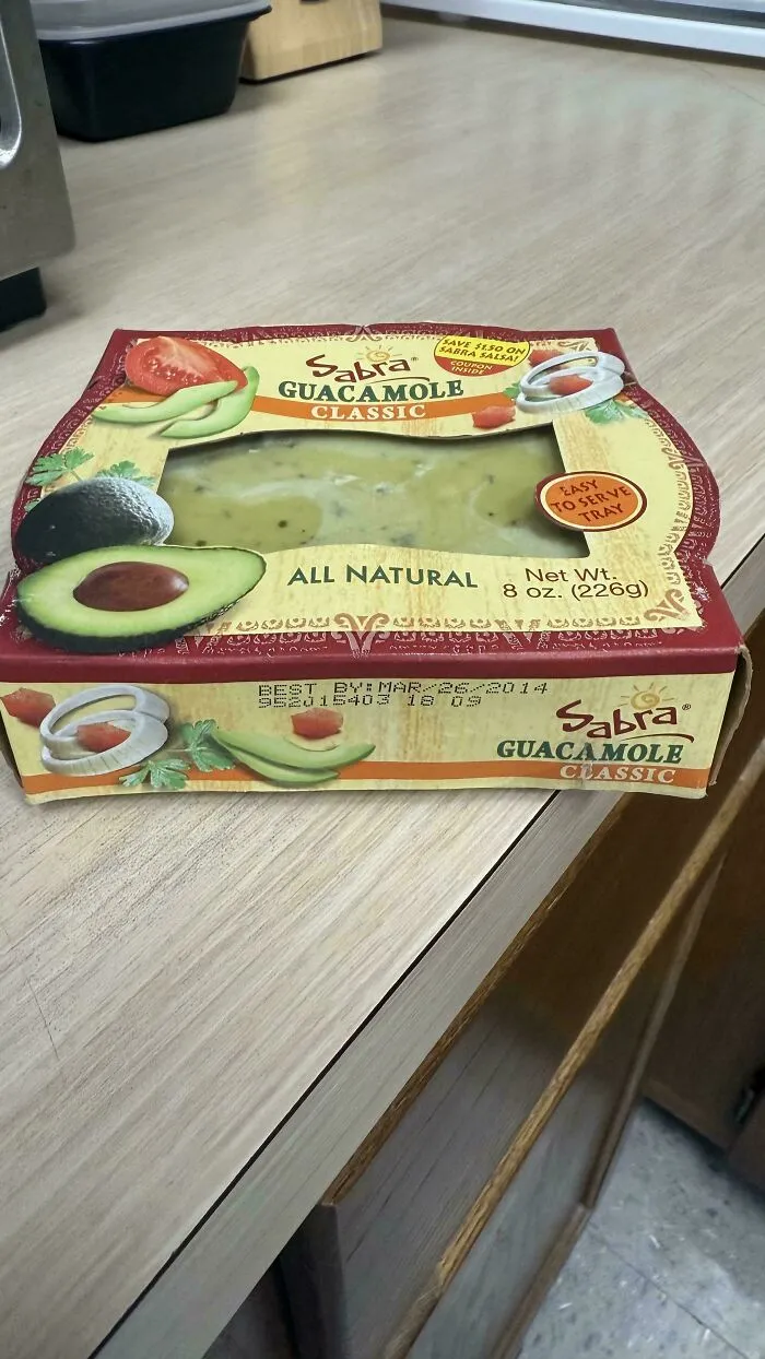 A package of Sabra Classic Guacamole with an expired date, an old product found at home.