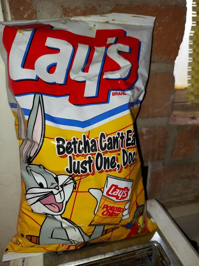 A large bag of Lay's potato chips featuring Bugs Bunny, an old product people found at home.