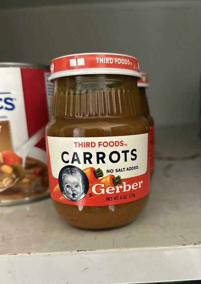 A jar of Gerber Third Foods Carrots baby food, an old product found at home that some people never throw away.