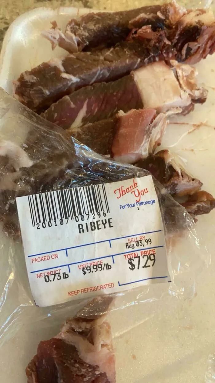 A package of ribeye beef with a label dated Aug 03, 99, a very old product found at home.