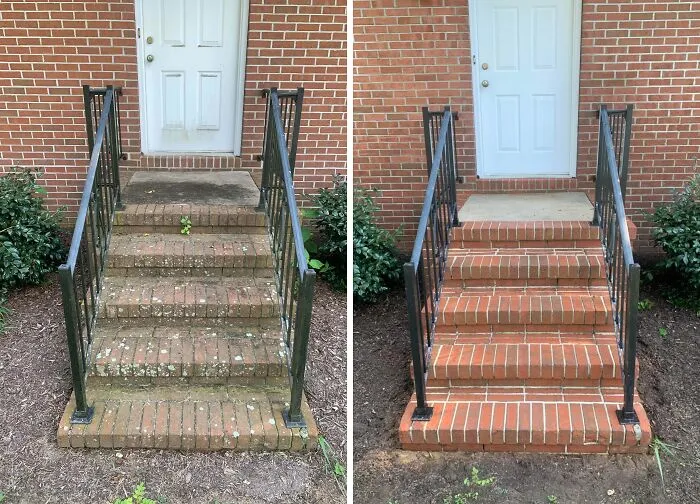 Satisfying power washing of dirty brick steps and railings, making them look new and clean.