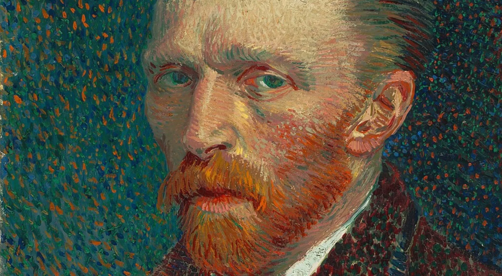 A close-up of a Vincent van Gogh self-portrait, showing his face, red beard, and part of his ear. Elementary school art.