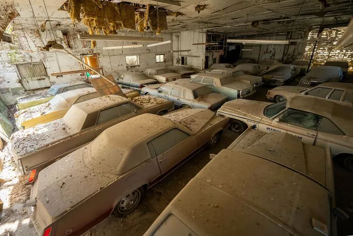 A Collection Of Vintage Cars Forgotten Inside A Collapsing Warehouse