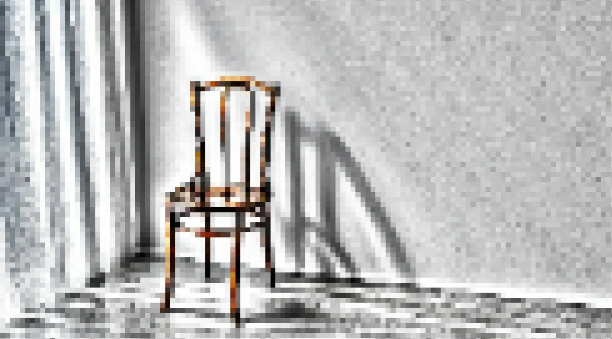 A distorted and glitched image of a chair, challenging viewers to guess the object.