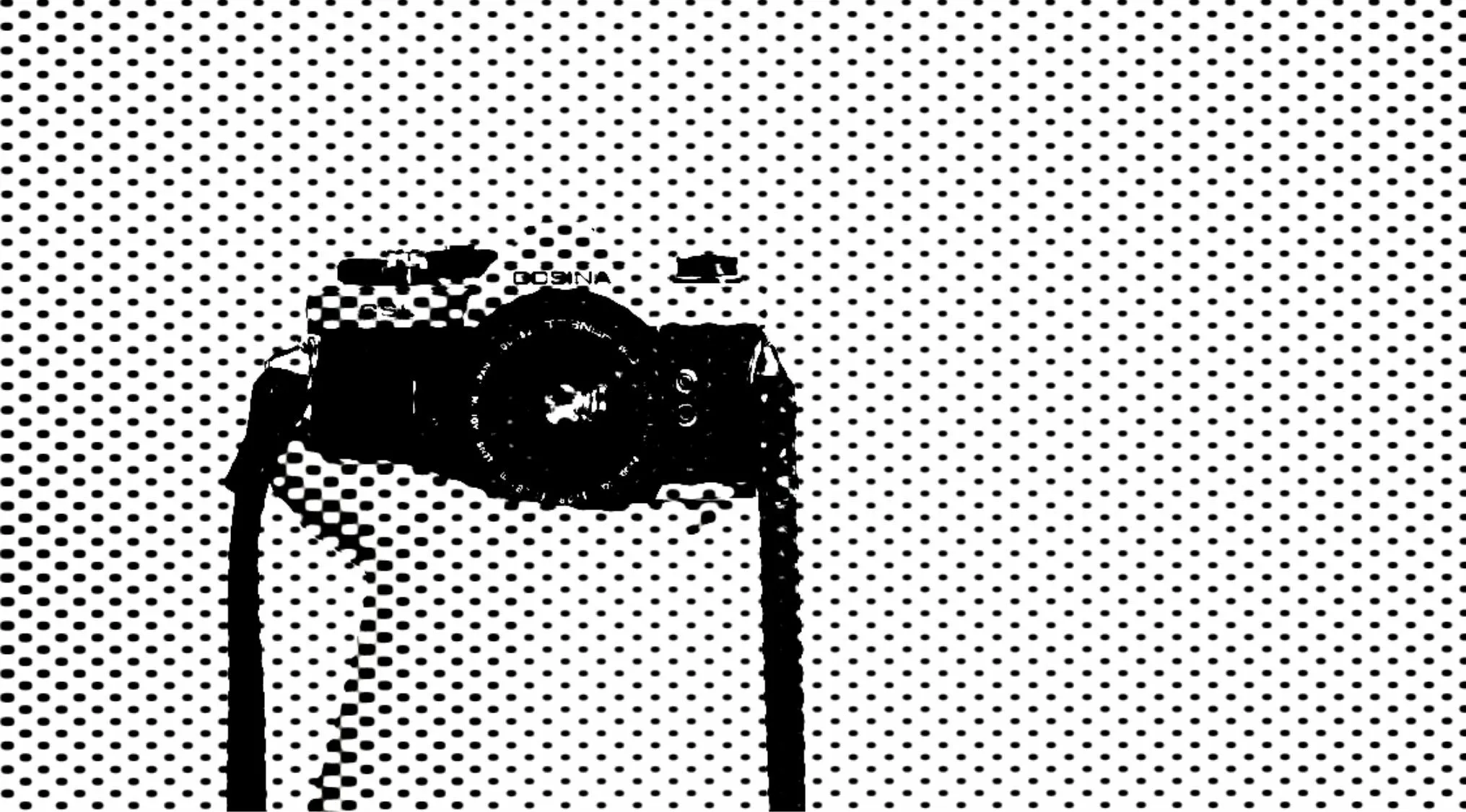 A black and white glitched image of a camera against a dotted background. Push your visual perception to its limits & name the object.