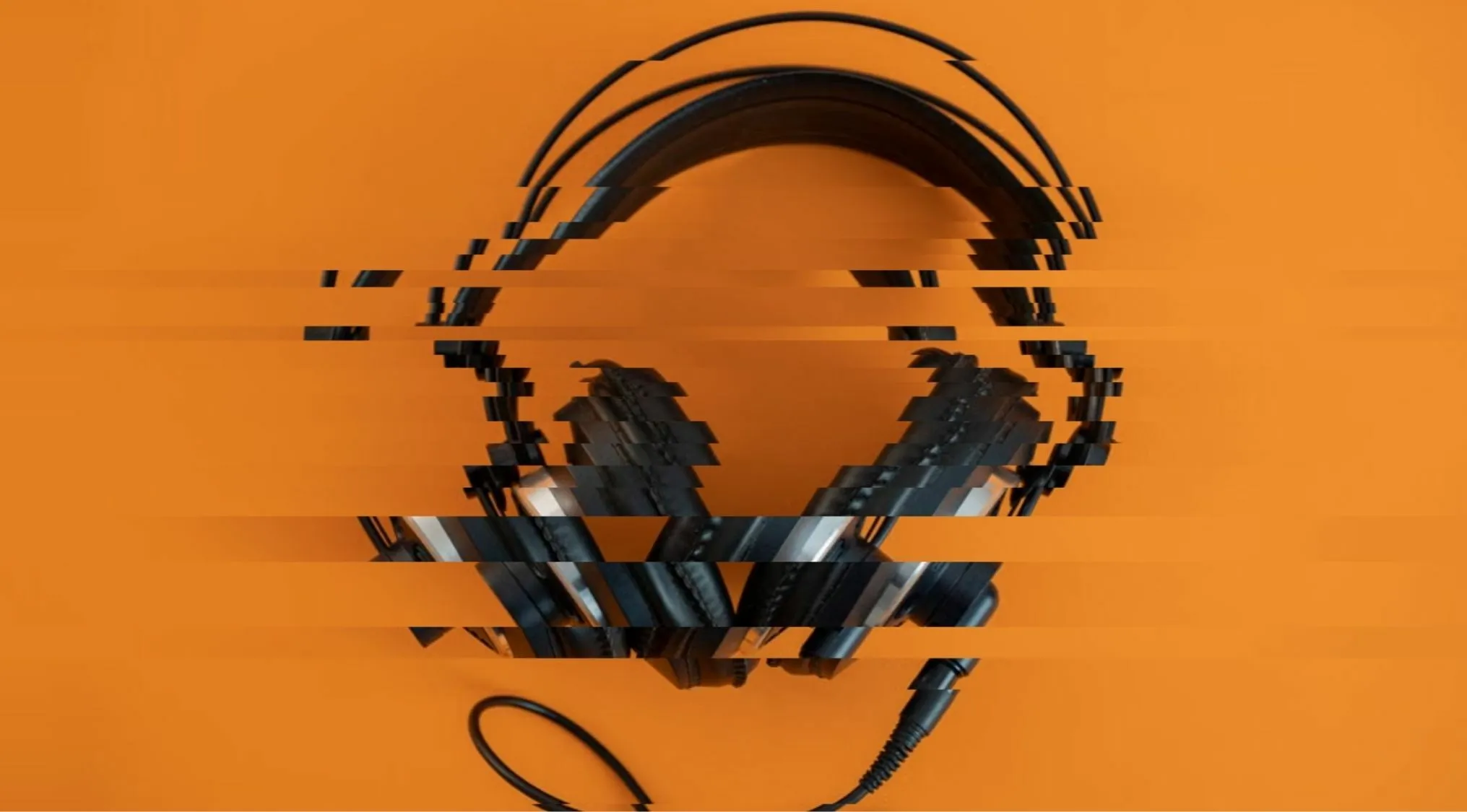A distorted and glitched image of headphones on an orange background for Guess 18 Objects From Distorted And Glitched Images.