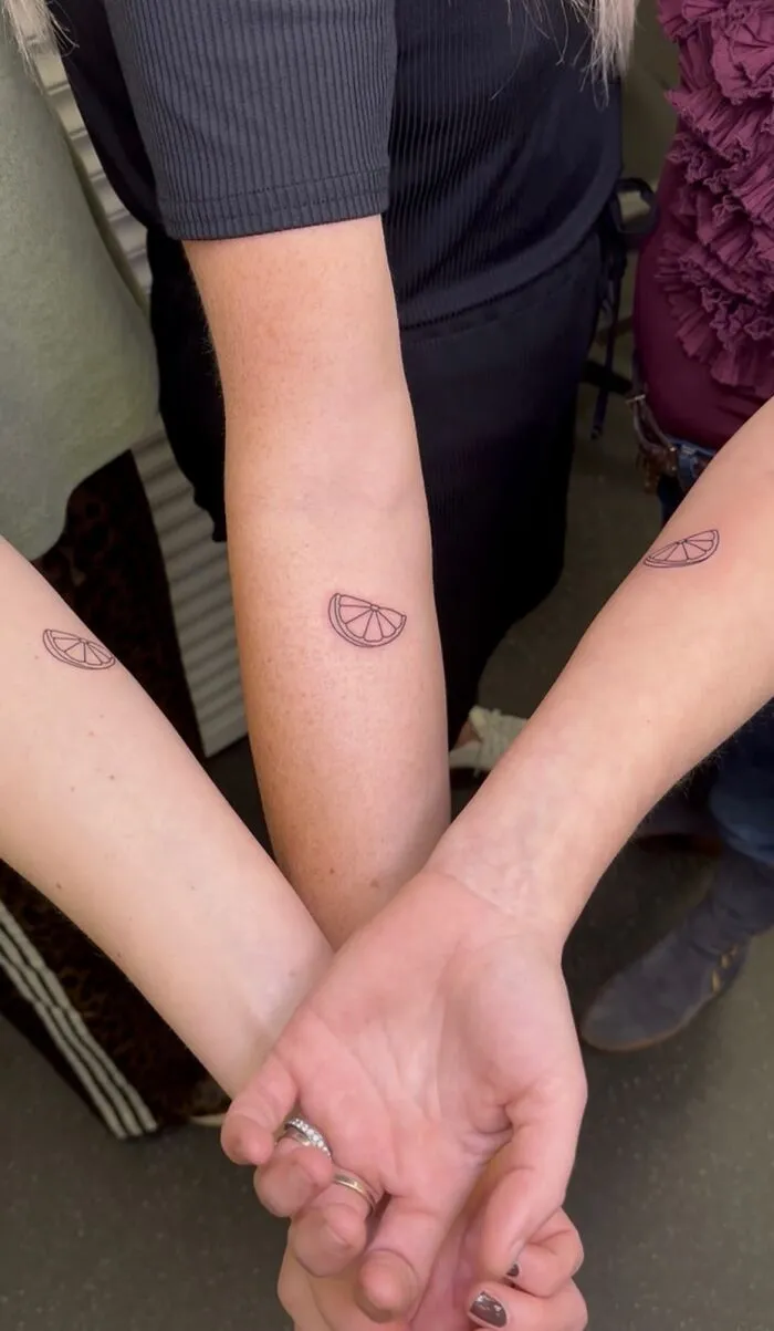 Three Good Colleagues And Their Employer’s Logo