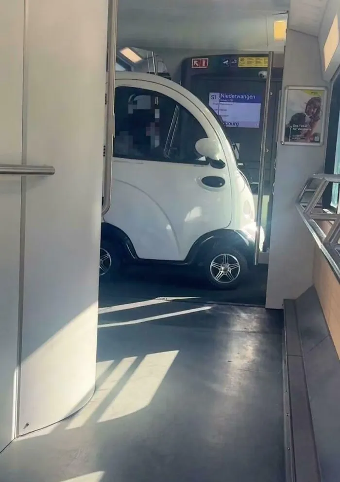 A Swiss Woman Drives Her Microcar Onto The Train Because It’s Too Slow. Once You’ve Reached A Certain Level Of Aura, You No Longer Have To Be Considerate