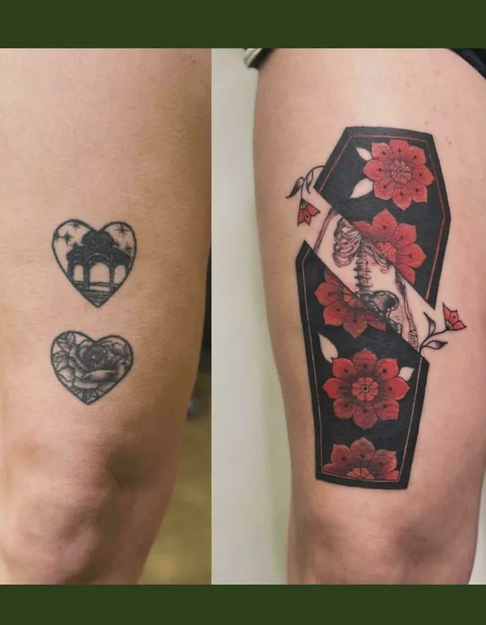 Two small heart tattoos are covered by a striking coffin design with red flowers and a skeletal hand, an incredible tattoo cover-up.