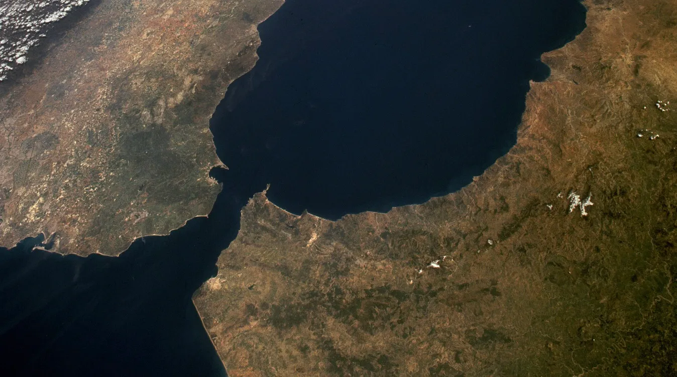 An aerial view of the narrow body of water separating Spain and Morocco, known as the Strait of Gibraltar.