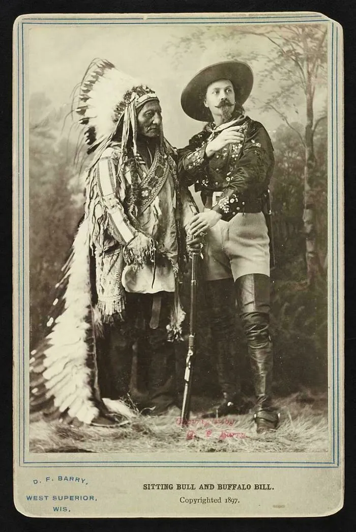 A black and white photo of Sitting Bull and Buffalo Bill, two interesting figures from history.