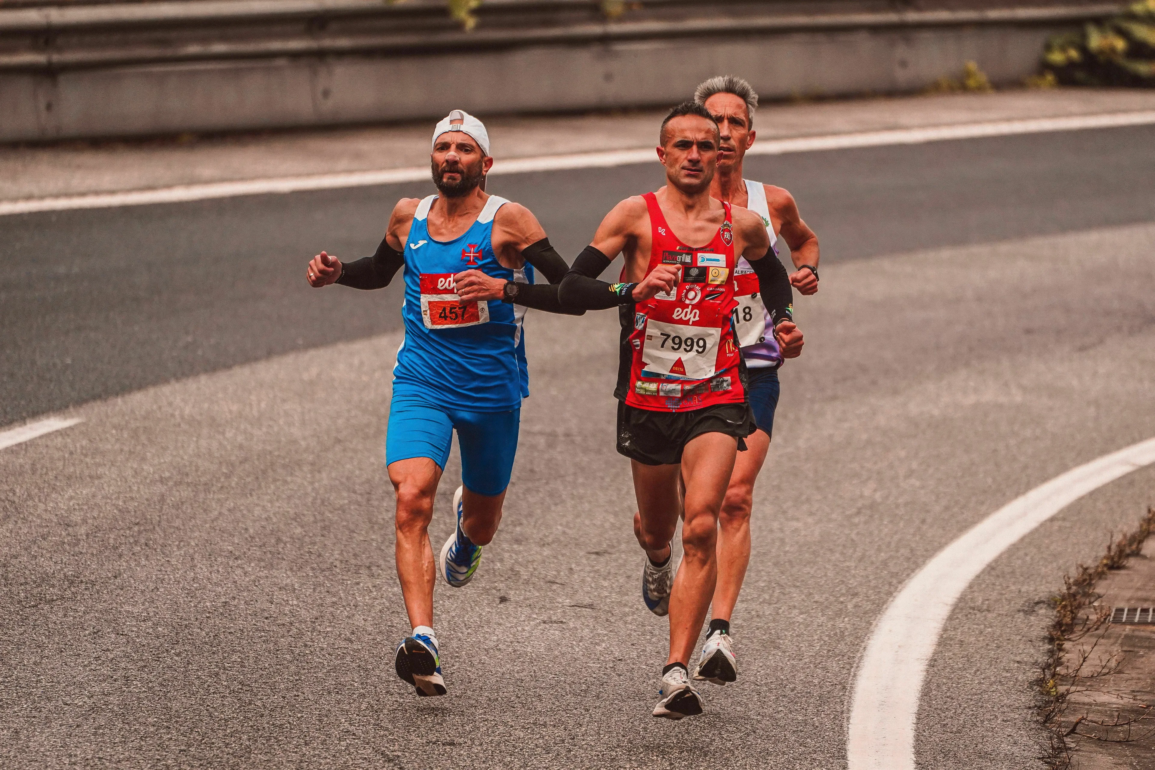 Runners in a race, with one overtaking the person in second place. A One Percent Club test question.