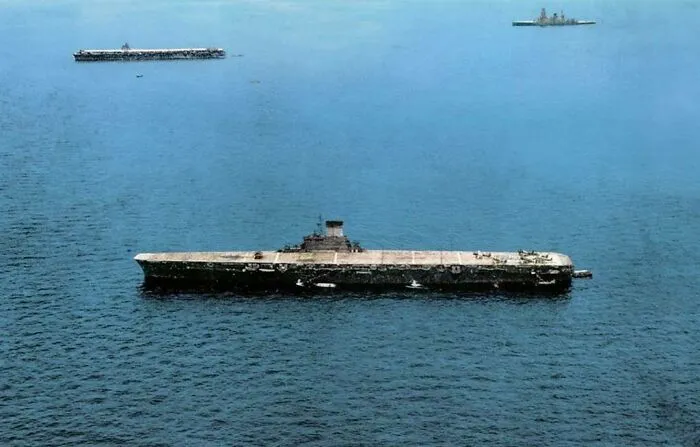 Japanese Aircraft Carrier Taiho At Anchor, Probably At Tawi-Tawi, Philippines. In The Background Are A Shokaku-Class Carrier And A Kongo Class Battleship