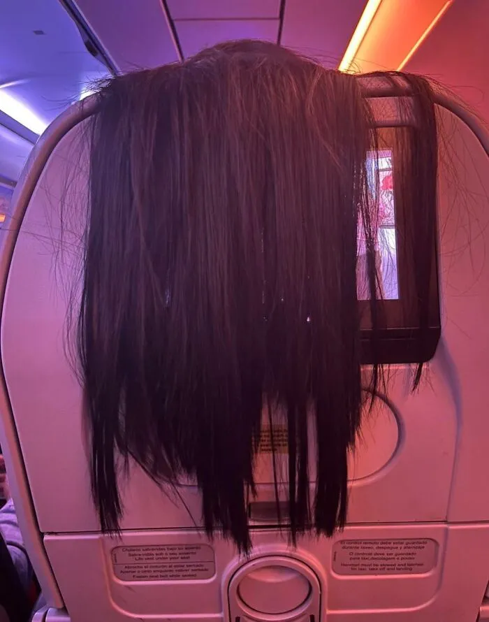 Trying To Watch A Movie On The Airplane