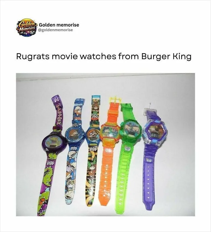 A collection of colorful Rugrats movie watches from Burger King, a nostalgic 90s post. Golden Memories of fast-food toys.