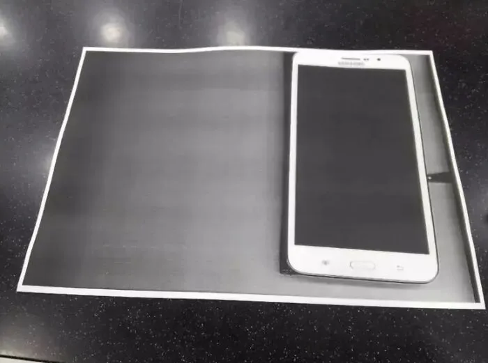 A printout of a smartphone, humorously depicting how some people can be dumb about technology.