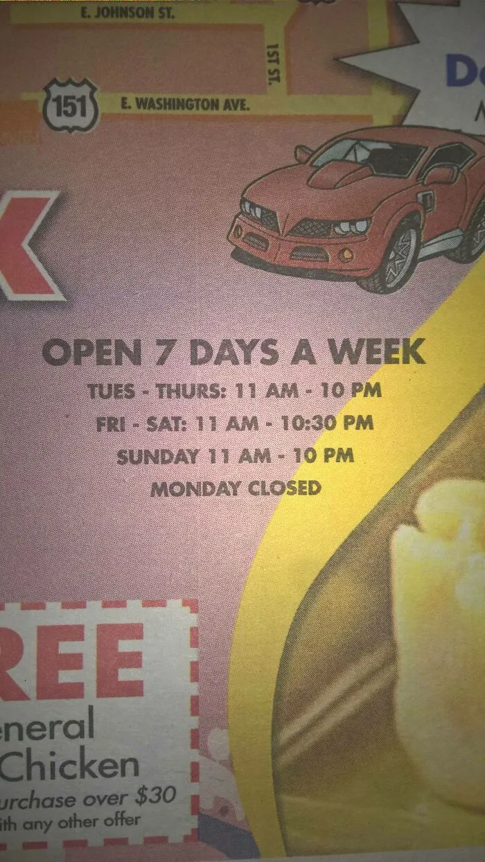 A restaurant sign that says Open 7 Days a Week but then lists Monday as closed, a dumb mistake.