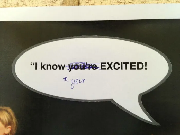 A speech bubble with the phrase I know you're EXCITED with you're misspelled as your, an example of people so dumb.