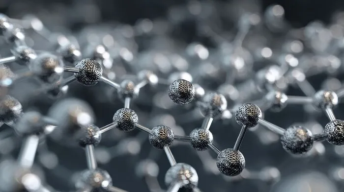 Abstract image of interconnected metallic spheres, representing molecular structure and healthy habits.