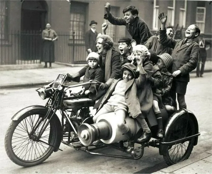 Nancy Debenham Giving A Group Of Children A Ride On Her Motorcycle, 1923