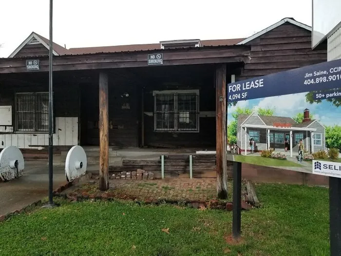 A vision of a renovated house for lease next to the actual dilapidated building, highlighting architects expectations versus reality.