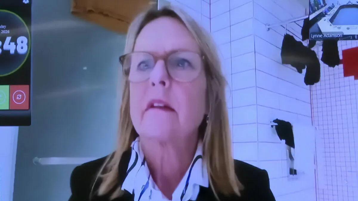 Politician Caught In Awkward Scandal After Constituents Notice Her Background In Livestreamed Meeting
