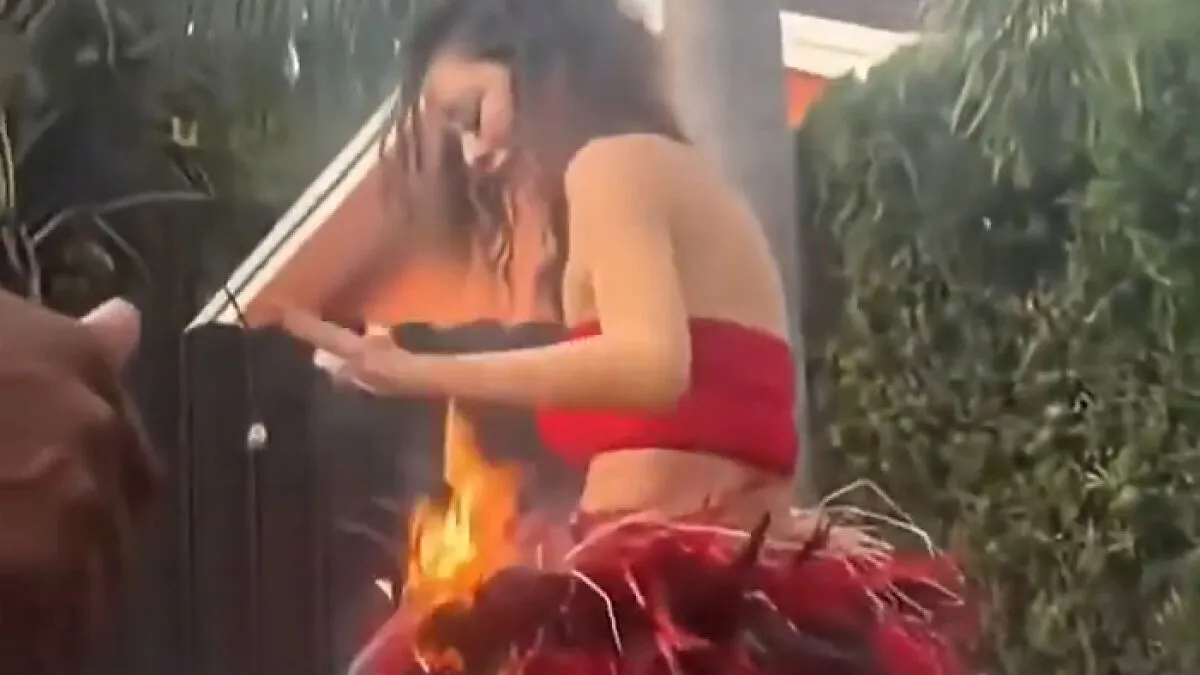 Woman's Skirt Catch Fire Mid-Performance, But Man's Split-Second 'Executive Decision' Is Going Viral