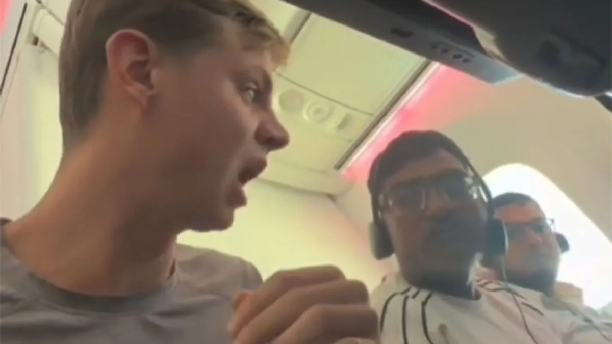 Passenger Confronts Total Stranger For Chewing With His Mouth Open On Plane, Sparks Viral Debate