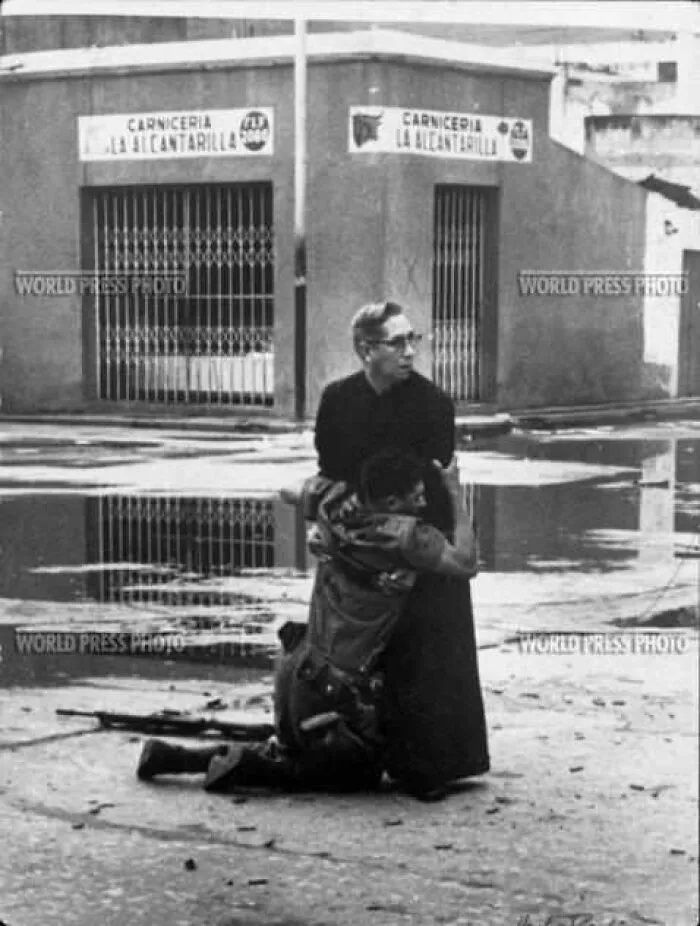 I'm Not A Religious Person, But This One Always Gets To Me. A Catholic Priest Giving A Soldier The Final Rites In The Middle Of Sniper Fire