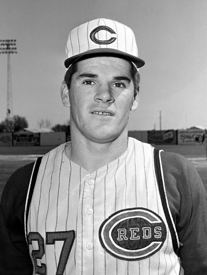 A black and white image of a baseball player in uniform, part of the fascinating world records throughout history.