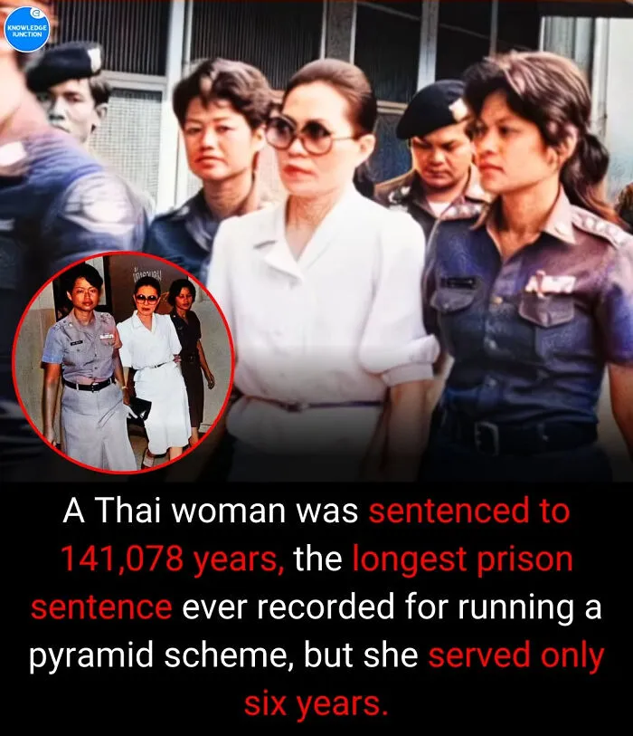 A Thai woman in a white dress surrounded by police, illustrating a world record prison sentence.