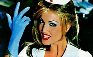 27 Years After Blink-182's Enema Of The State, The Cover Nurse Looks Completely Unrecognizable