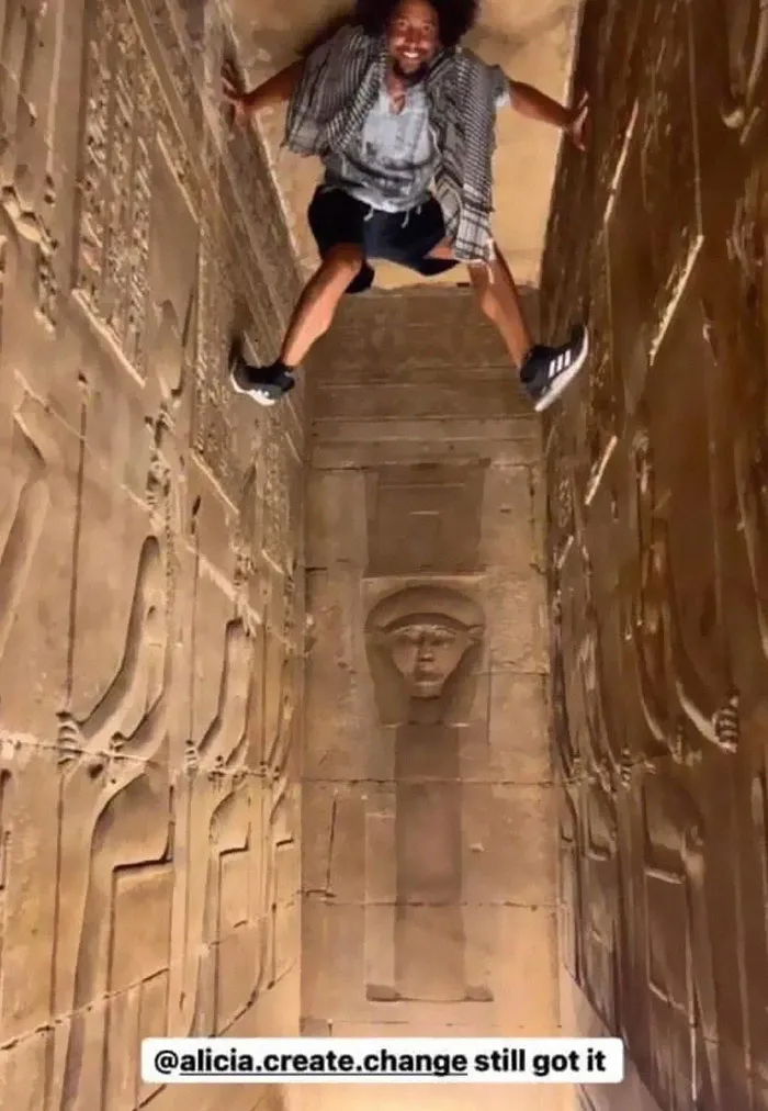 A British Afrocentric Influencer Climbed Temple Walls With His Shoes On
