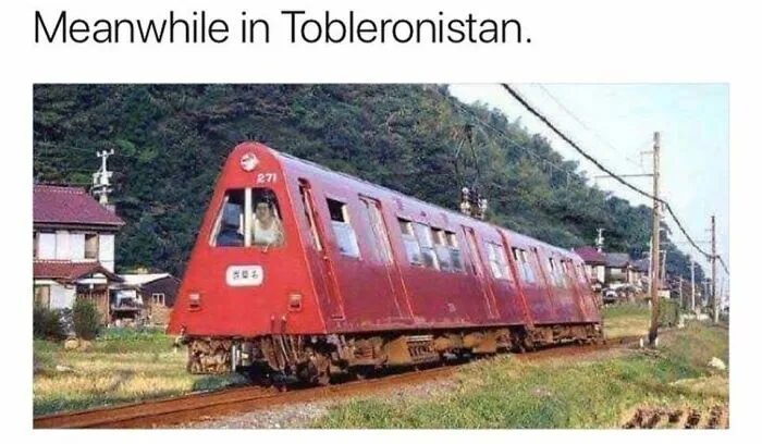 Funny meme of a train shaped like a Toblerone chocolate bar