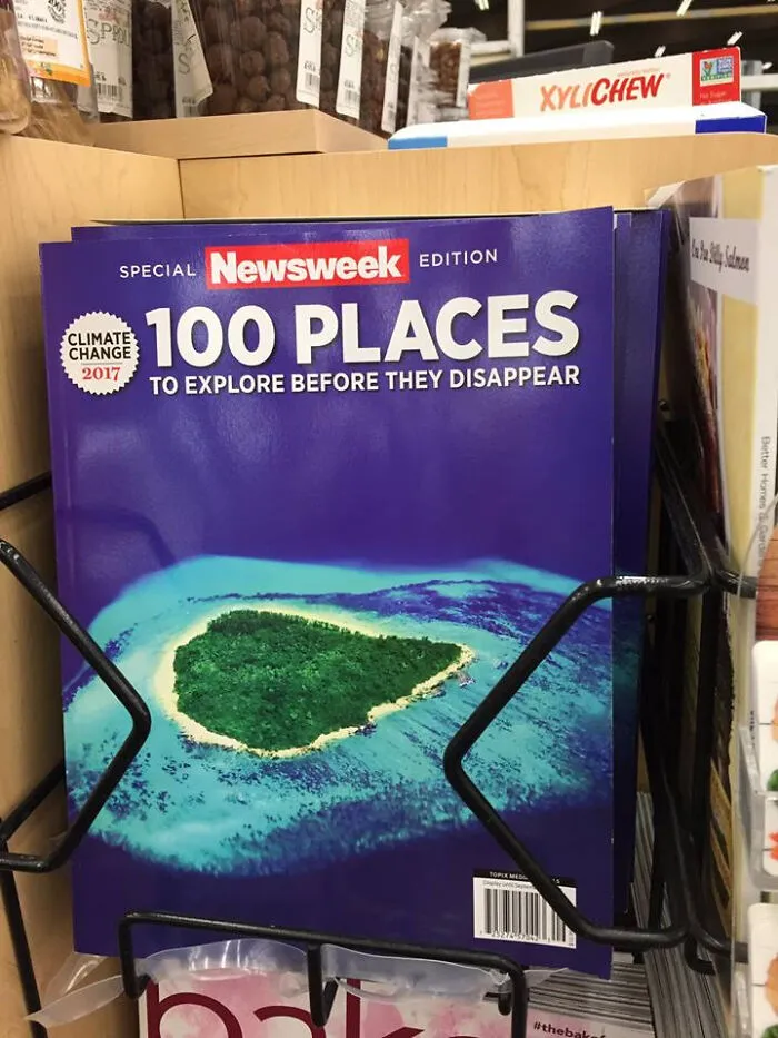 A Newsweek magazine titled '100 Places to Explore Before They Disappear,' depicting a sad world due to climate change.