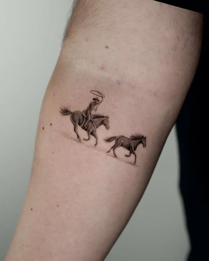 Tattoo of a cowboy riding a horse and a running horse animal tattoo