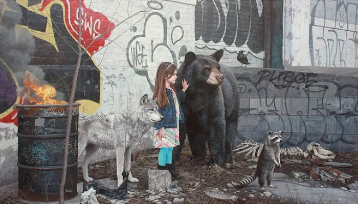 A girl stands with a wolf, a bear, and a raccoon by a fire barrel in dystopian paintings by Kevin Peterson.