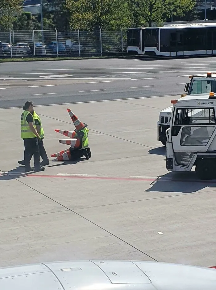 Workers At Prague Airport Having Fun