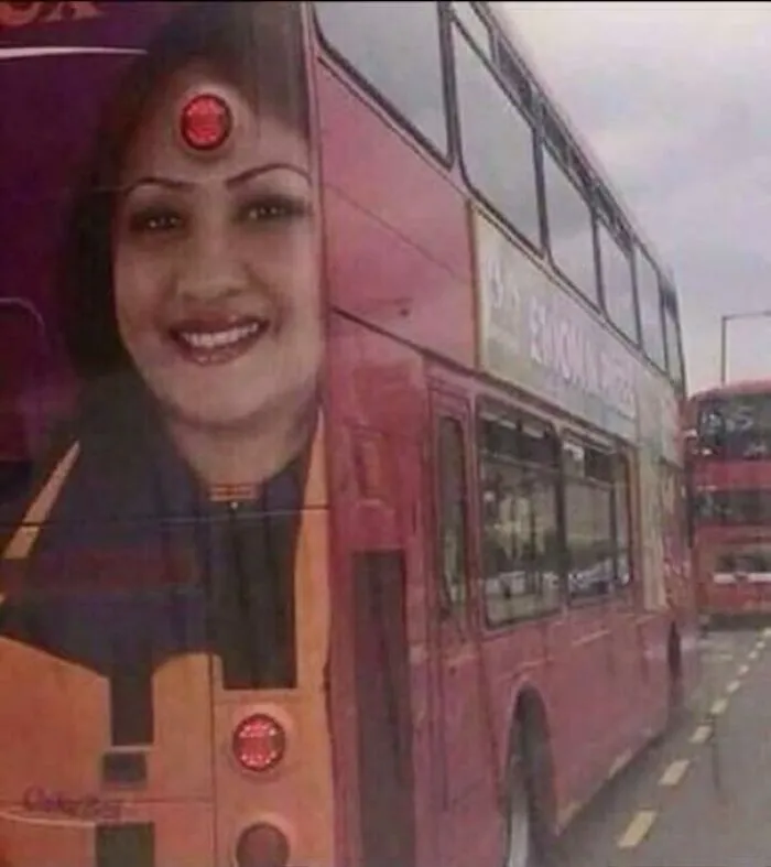Hilarious ad placements: Woman's face on bus with a brake light as a bindi, proving context matters.