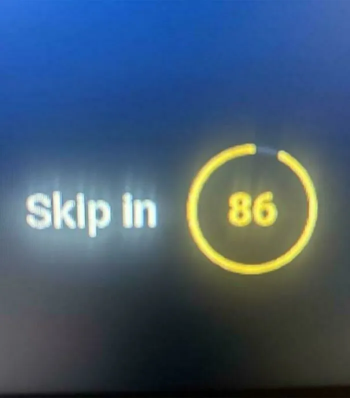 A screen displaying Skip in and the number 86 in a yellow circle, reflecting the horrid and sad world.