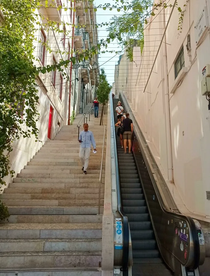 Lisbon Consists Of 7 Hills. In Order To Make It Easier For Residents And Tourists To Move Between The Different Neighbourhoods, This Open-Air Escalator Was Installed