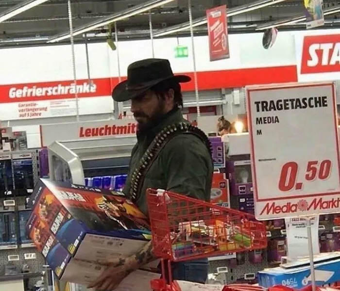 A man dressed like a cowboy, wearing a black hat and a bandolier, shopping for unhinged images.